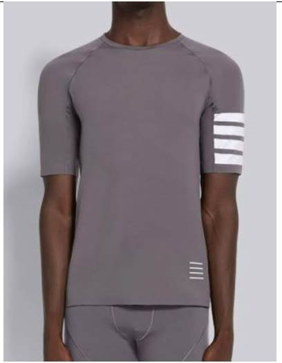 A person wearing a grey shirt

Description automatically generated