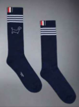 A pair of socks with a dog on them

Description automatically generated